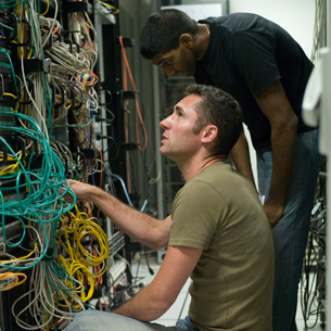 technician repairing wiring